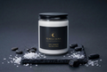 Tidal Harmony ritual soy candle with sea botanicals on dark slate — Áurea Luna